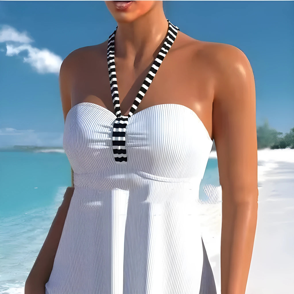 Women's black and white striped off-shoulder swimsuit with briefs cut on mannequin