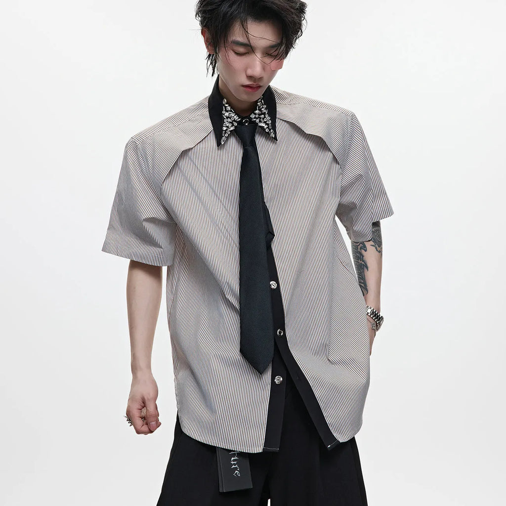 Men's blue loose fit diamond tie patchwork striped shirt with flip collar and button decorations.