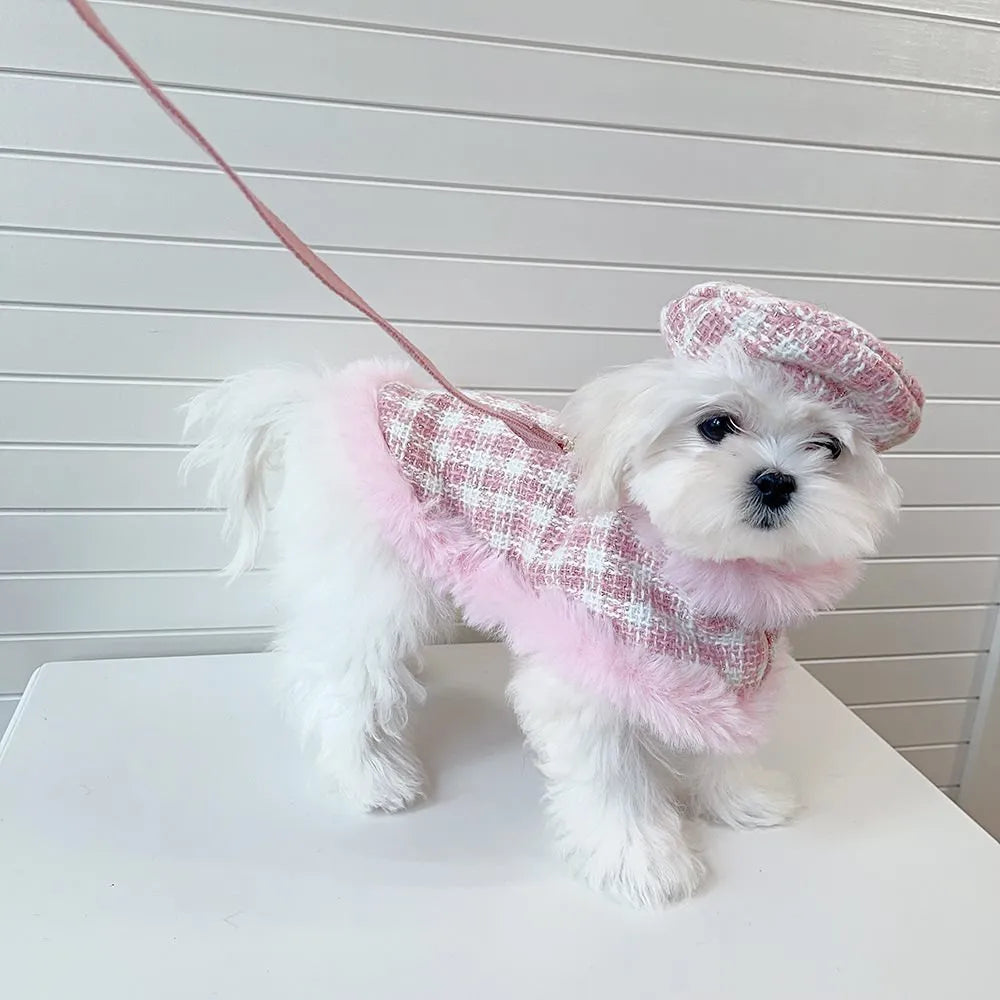 Pink polyester cat cloak with attached rope and matching beret for winter wear.