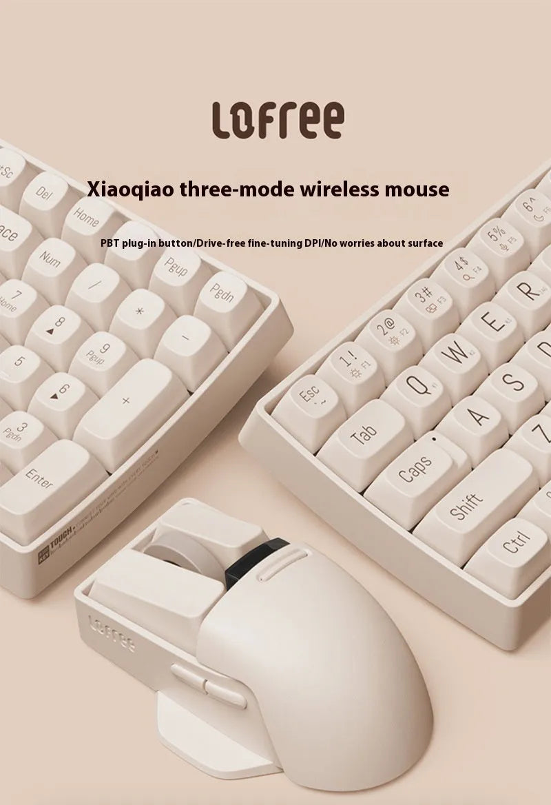 Xiaoqiao tofu colour wireless mouse with seven buttons and a scroll wheel on a desk.