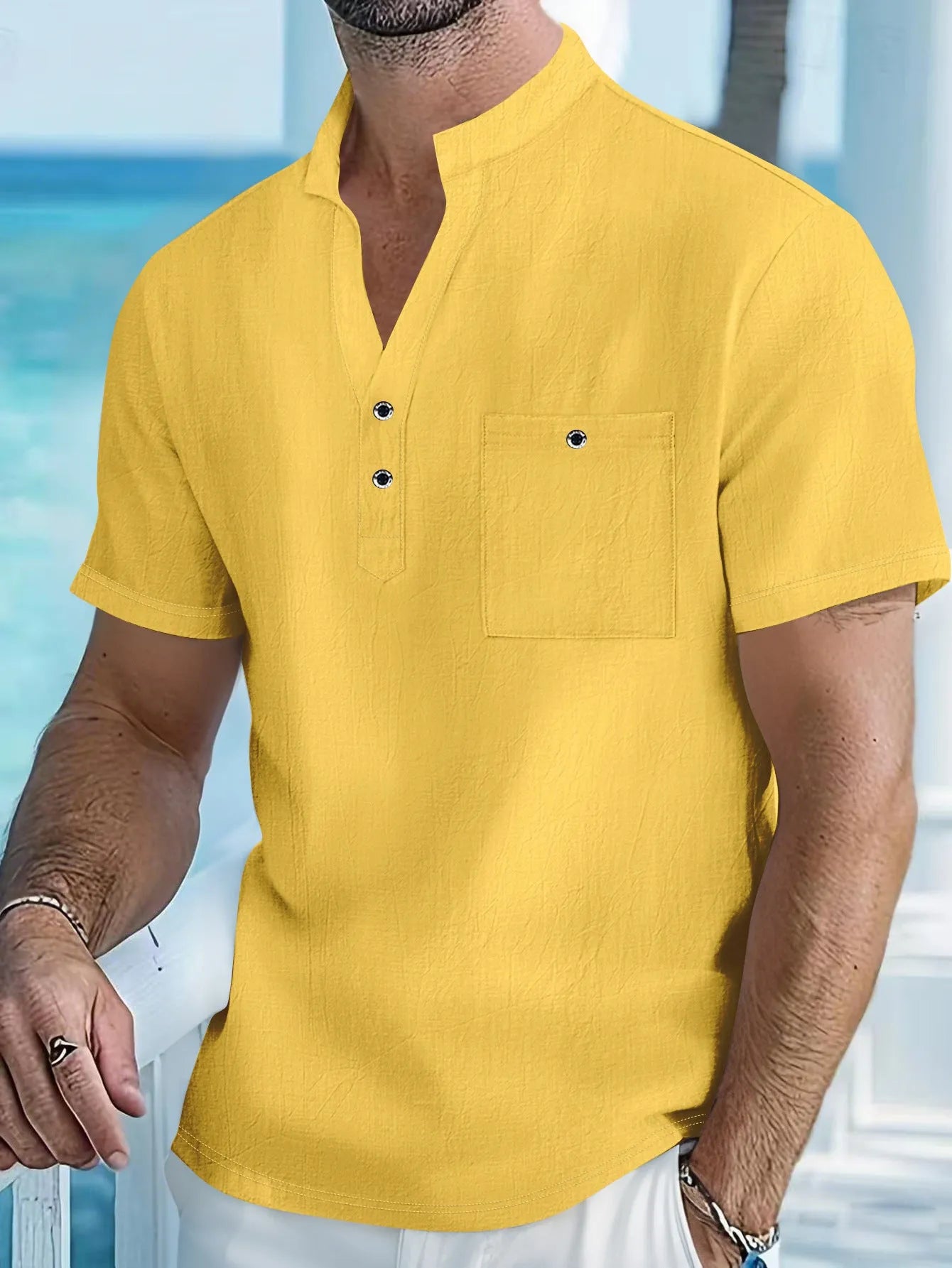Men's loose fit linen blend short sleeve T-shirt with a stand collar in a light colour.