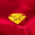Gold geometric flower ring with textured brass construction and open diamond design
