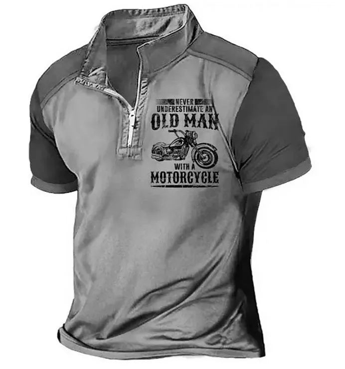 Man wearing a casual lapel polo shirt with a digital print design and zipper detail.