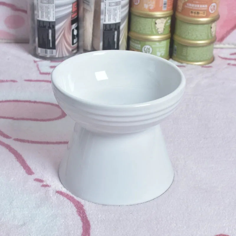 Ceramic pet bowl with anti-tumble design and raised chin support for cats and dogs