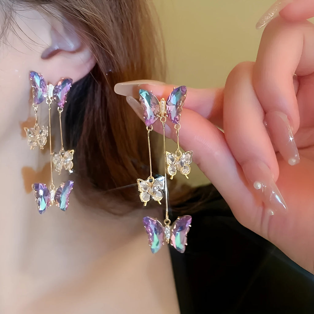 Silver needle crystal flowers butterfly tassel earrings with blue purple electroplated finish