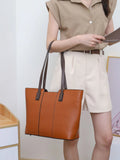 Genuine leather women's commuter shoulder bag in box-type shape with sewing line detailing and mobile phone compartment
