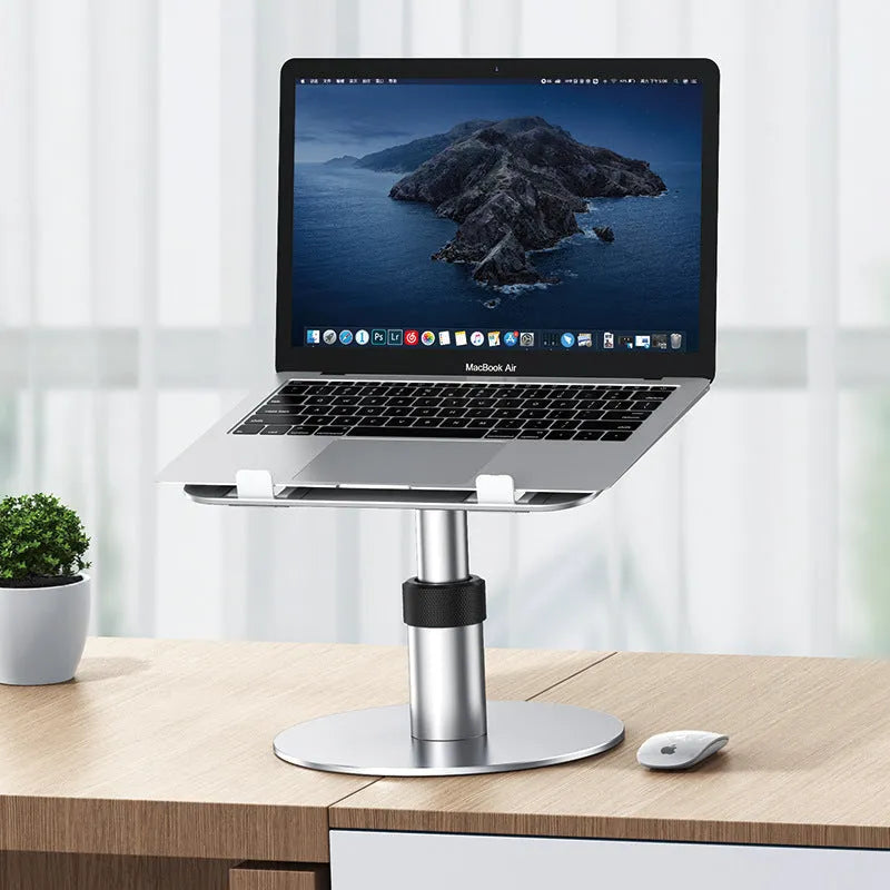 Silver adjustable car laptop stand with height settings and rotating base on a car seat.