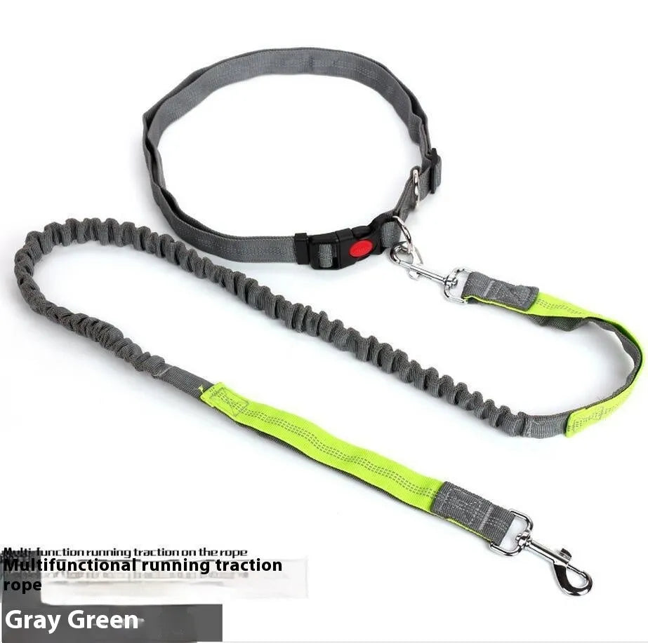 Grey and green reflective dog leash with elastic section shown on a table.