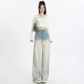 Gradient blue women's denim trousers with straight-leg cut and wider leg opening