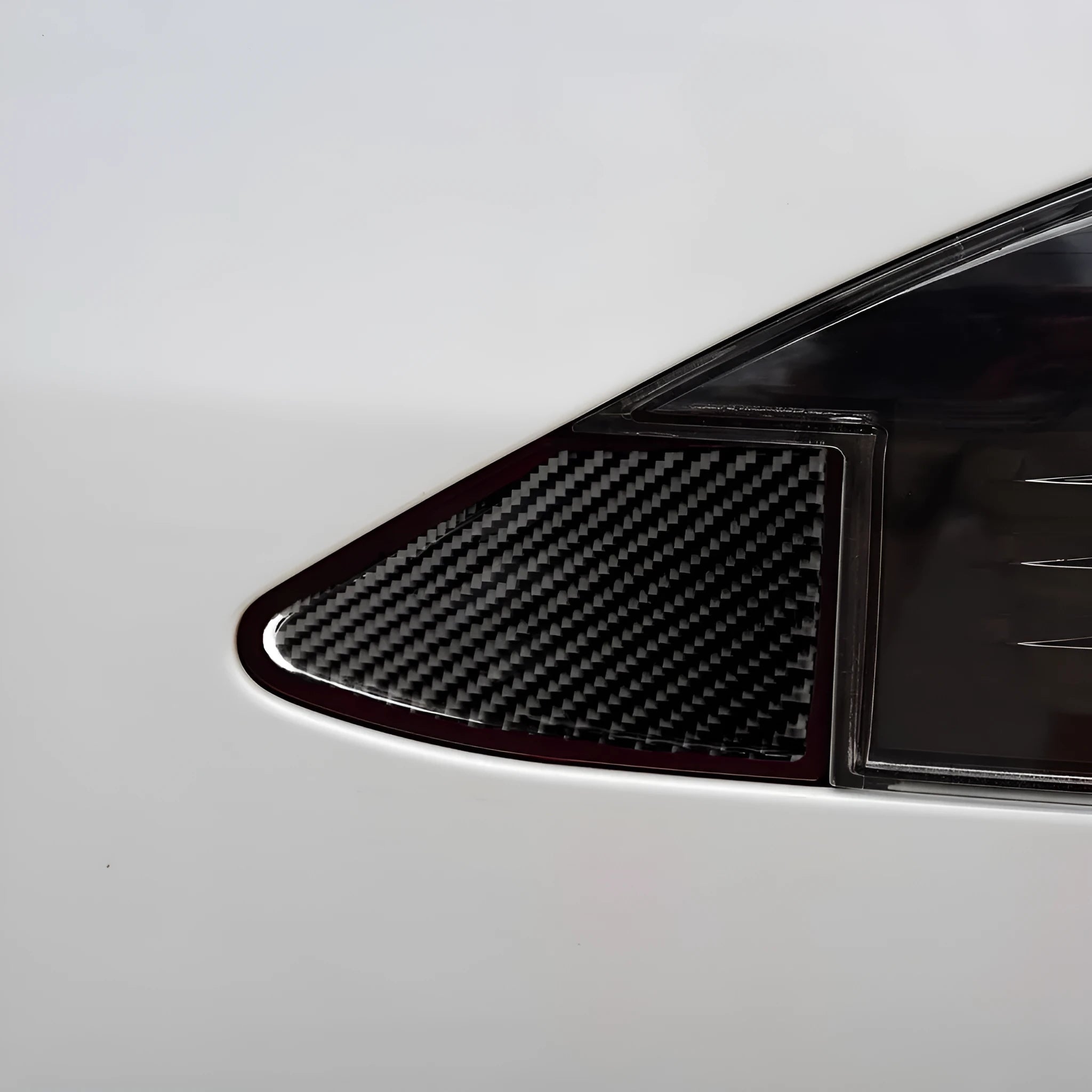 Carbon fibre decorative sticker for refreshing USB charging port panels on laptops and devices.