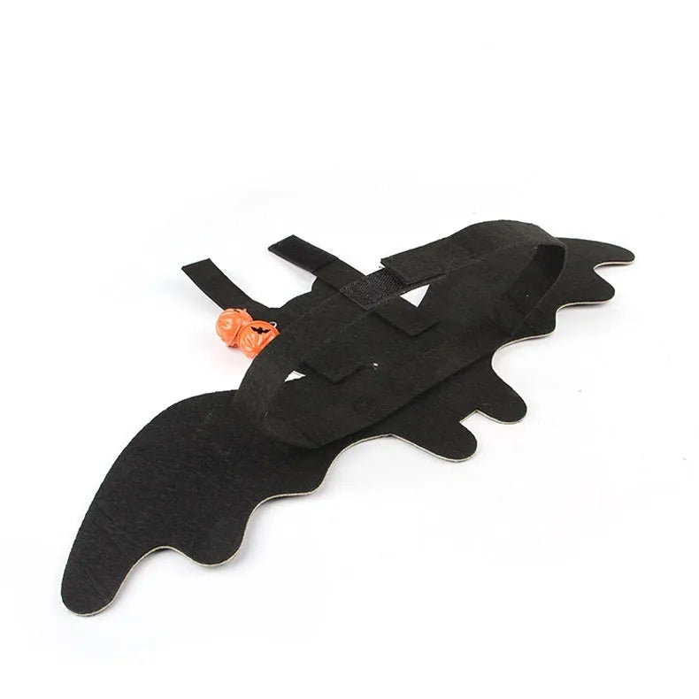 Halloween batwing costume for a cat on a mannequin, shown in orange pumpkin bat colour variant.