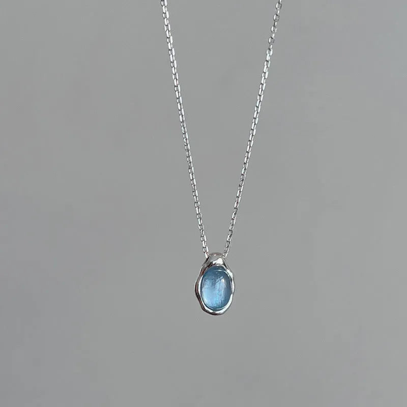 Navy blue water drop necklace pendant on adjustable cross chain, electroplated copper geometric jewellery