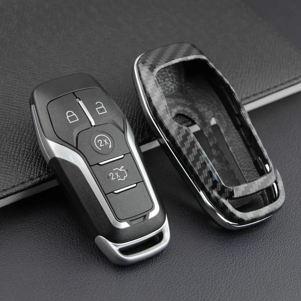 Plastic remote control protective shell for a car key shown in two variants: single shell and single shell with buckle.