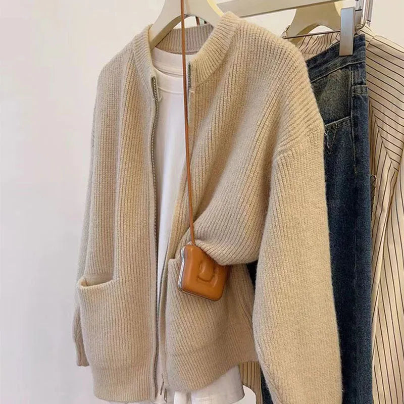 Beige soft glutinous sweater coat cardigan with long sleeves on hanger