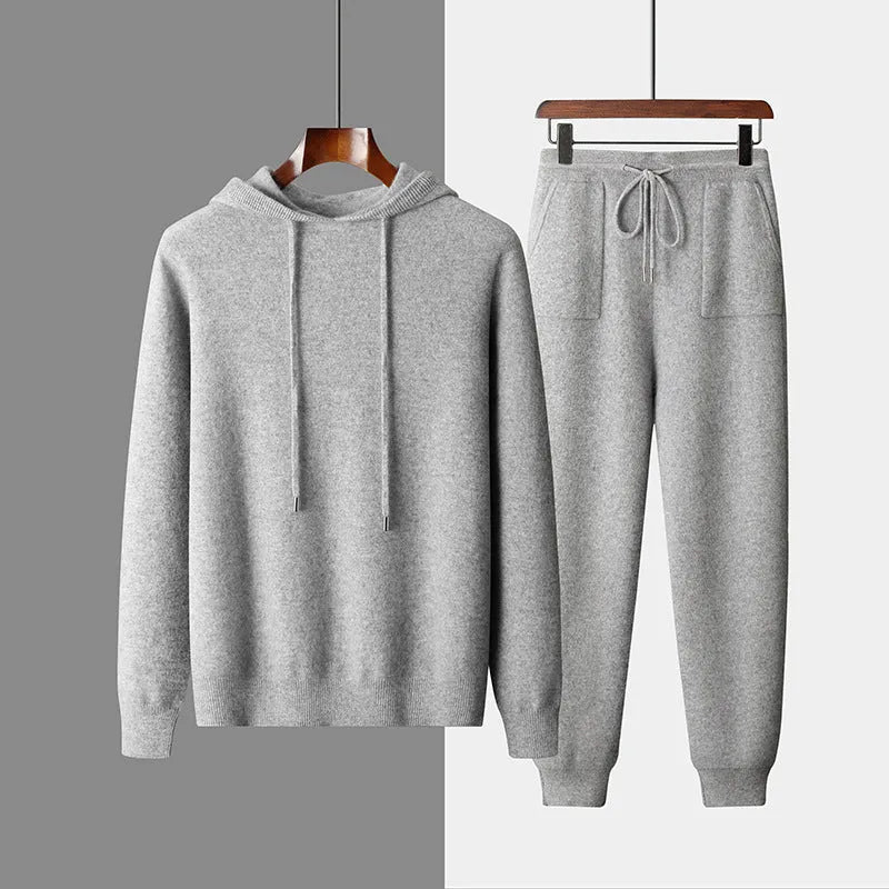 Men's dark grey cashmere hooded sweatshirt and trousers winter casual set laid flat