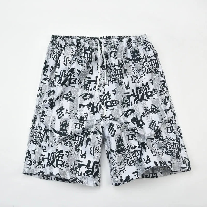 Men's floral print swimming trunks in multiple colour patterns with five-point design