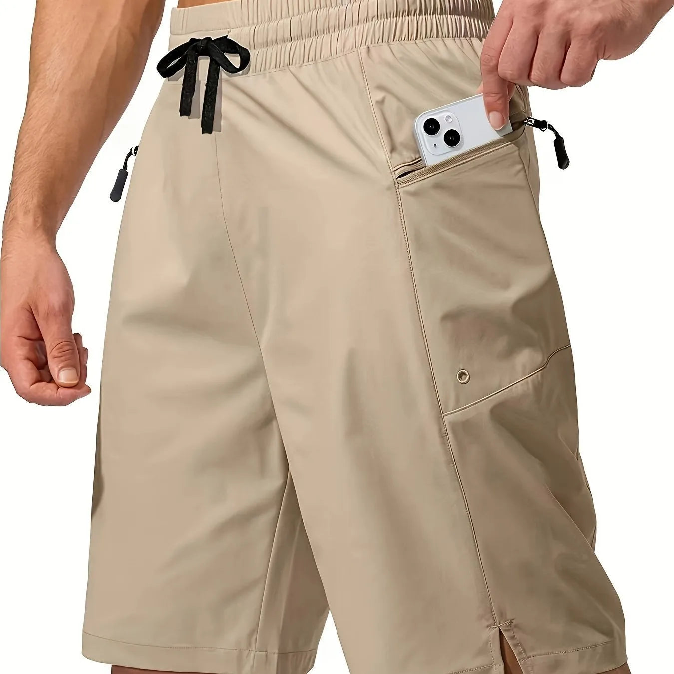 Man wearing solid grey quick-drying polyester beach shorts with a straight leg design.