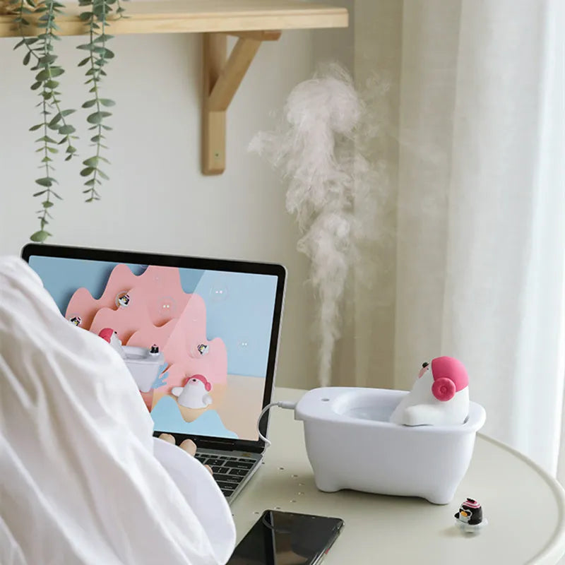 White USB-powered air humidifier with large water tank on a desk