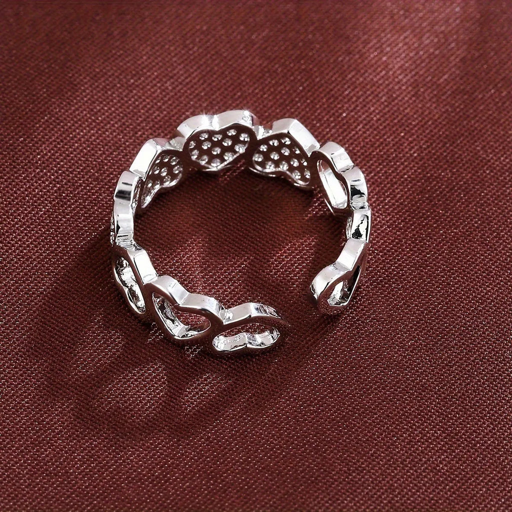 Adjustable opening copper heart ring with diamond treatment in gold colour for small fingers