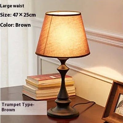 Brown retro alloy bedside lamp with dimmable LED lighting and speaker-style design
