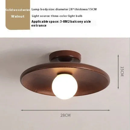 Minimalist solid wood and glass ceiling lamp in natural wood finish, 28cm diameter.