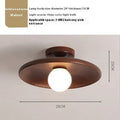 Minimalist solid wood and glass ceiling lamp in natural wood finish, 28cm diameter.