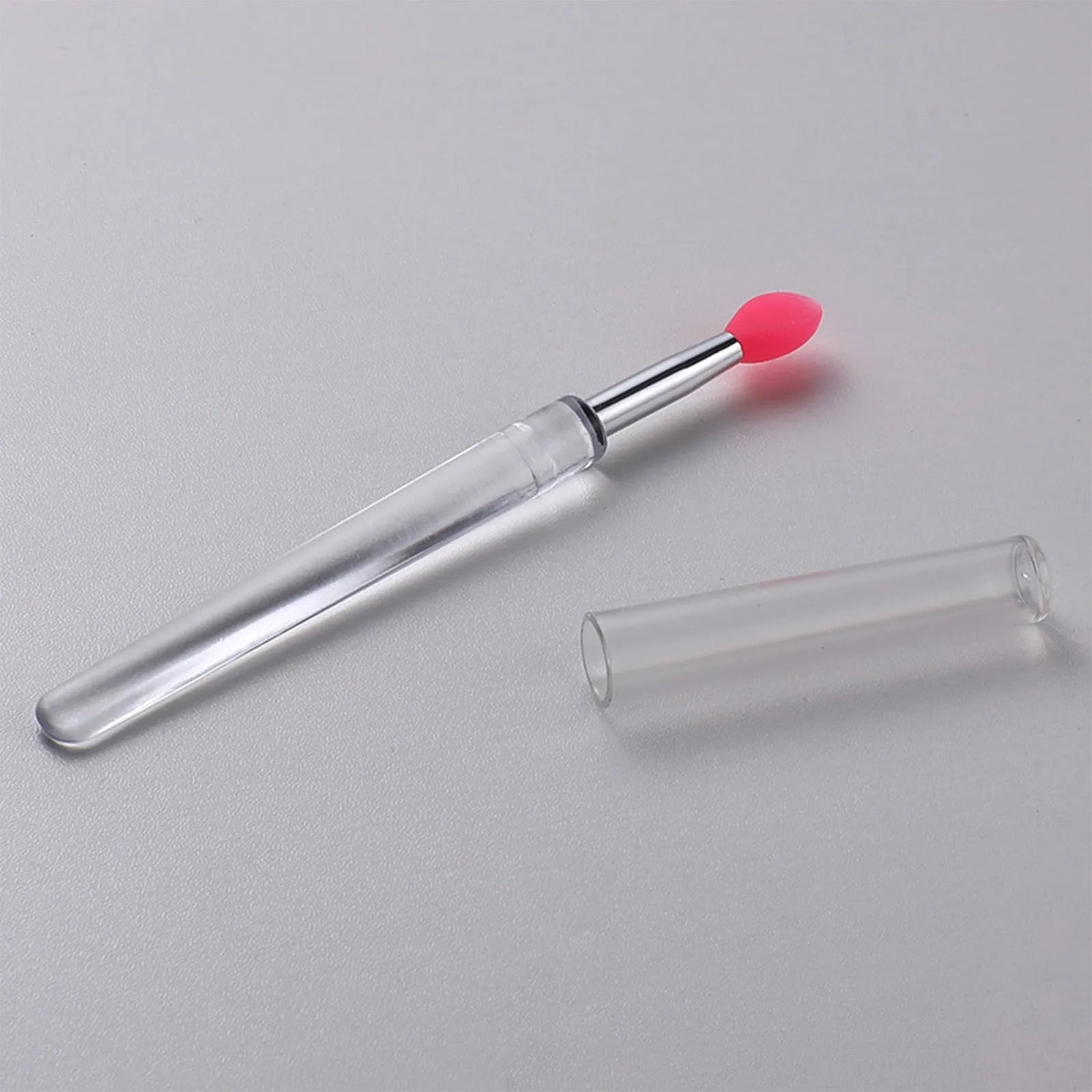 Set of reusable silicone lip brushes with protective caps in various colours