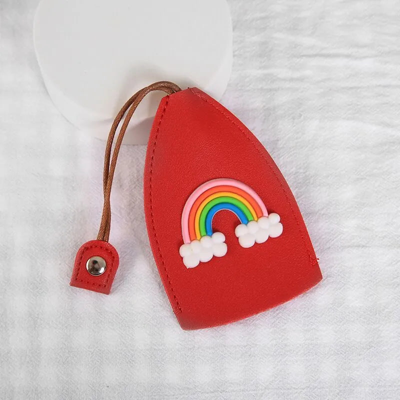 Cartoon pull-out car key case in PU leather with colourful designs measuring 14 x 7.5 cm