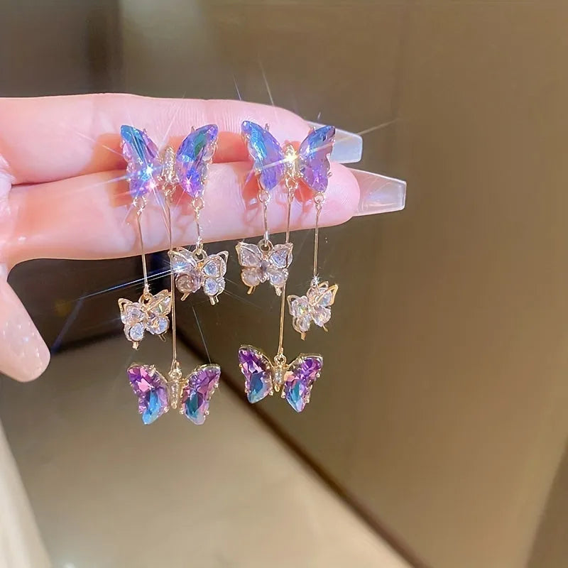 Silver needle crystal flowers butterfly tassel earrings with blue purple electroplated finish