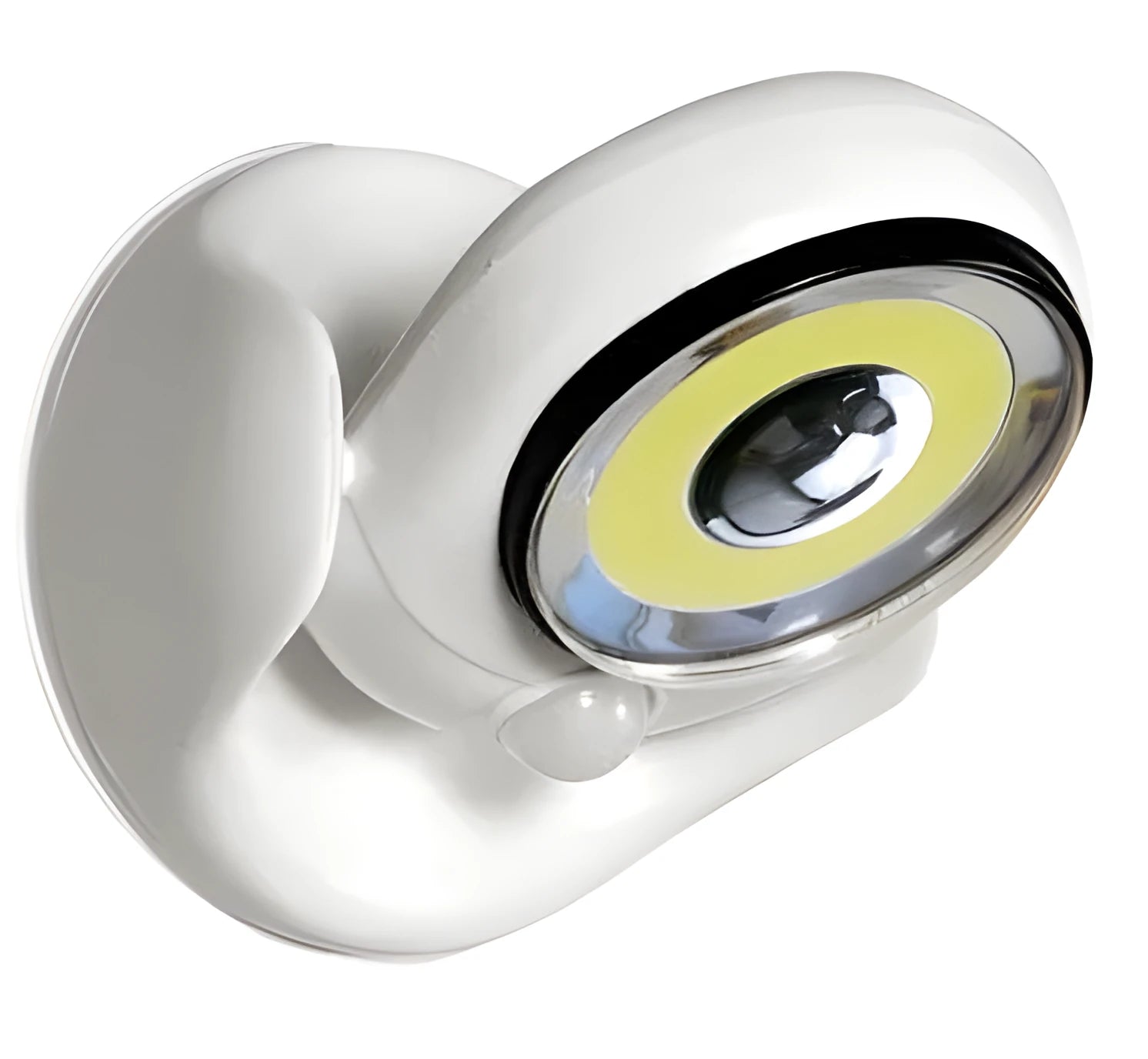White Atomic Angel induction-activated LED night light on a surface.