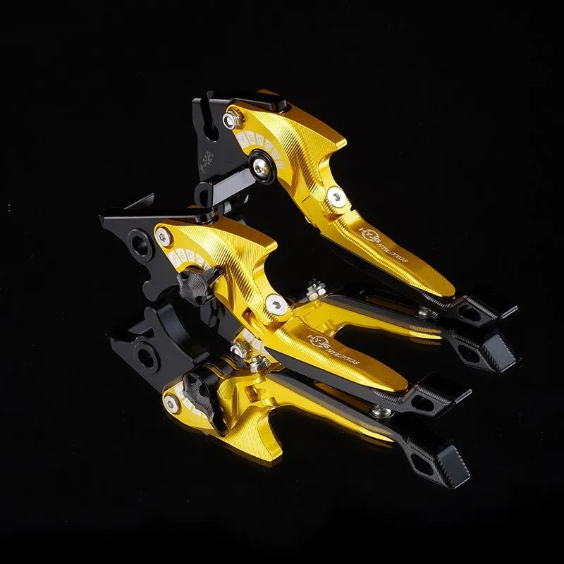 Pair of anodised metal motorcycle brake and clutch levers with adjustable length mechanism