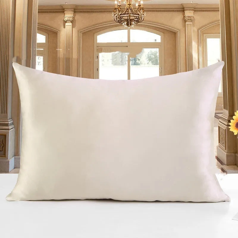 19 M double-sided silk pillowcase in apricot colour showing smooth texture and hem detail.