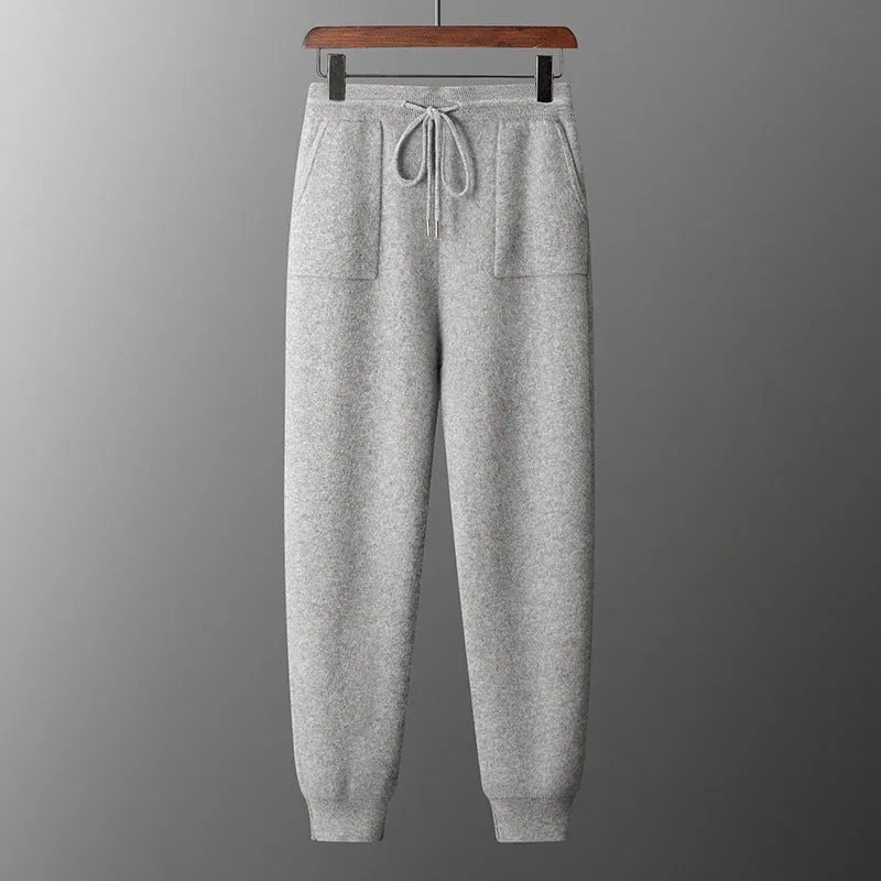 Men's dark grey cashmere hooded sweatshirt and trousers winter casual set laid flat