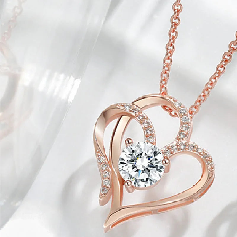 Simple heart-shaped women's necklace in 925 silver with choice of rose gold, platinum, or yellow gold plating.