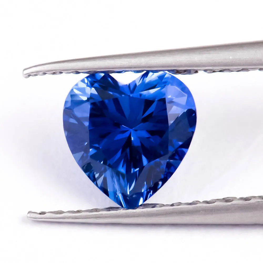 Royal blue synthetic gemstone showing heart, round, and pear cut shapes for jewellery making
