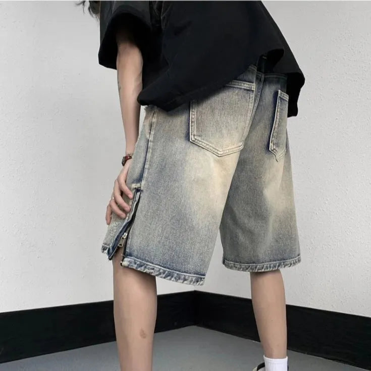 Blue retro denim shorts with wide-leg loose fit and tattered distressing details.