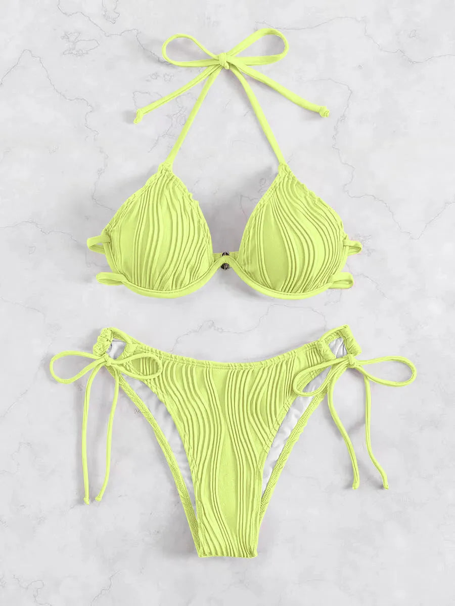 Women's apricot coloured underwire bikini swimsuit with adjustable side-tie bottoms on a mannequin.