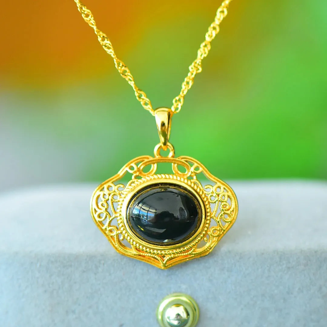 Gray Hetian jade pendant with copper inlay detailing on necklace chain
