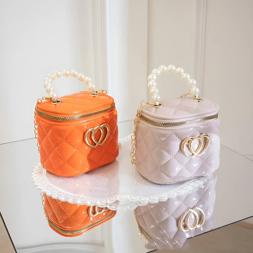 PVC bucket-shaped gel bag with a heart pattern, shown in one of seven available colours.