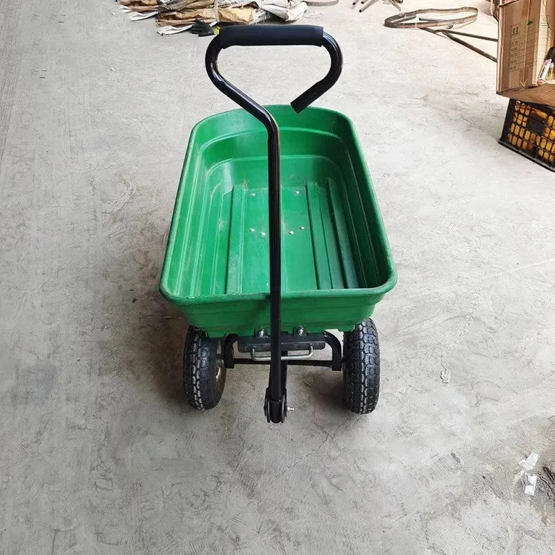 Green TC2145 four-wheel plastic dumptruck with a steel and PP body for garden hauling.