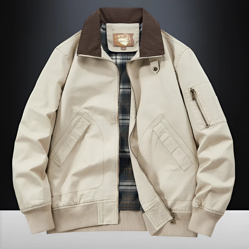 Men's washed cotton baseball flight jacket in beige, shown on a hanger.