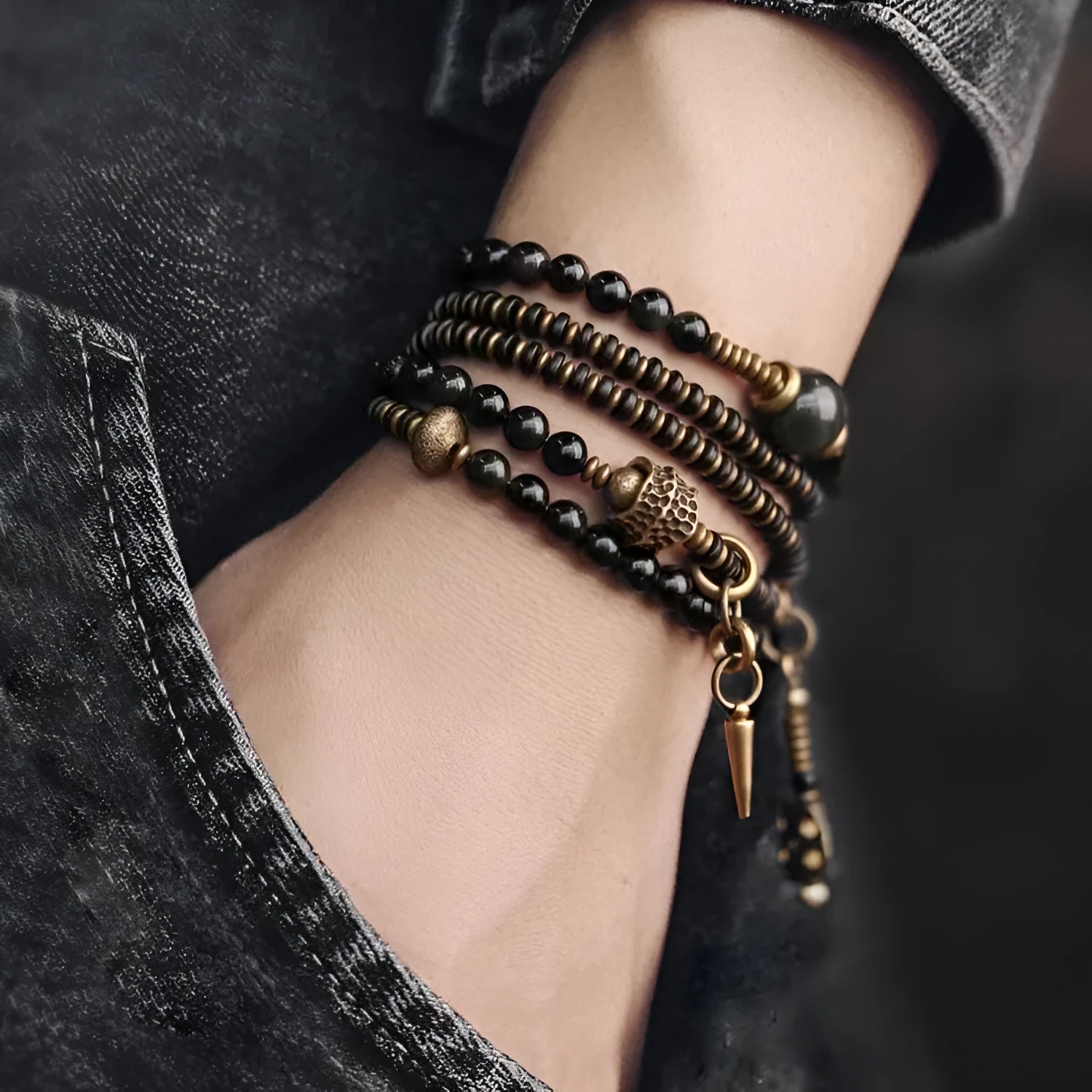 Black geometric beaded bracelet with colourful layered retro design.