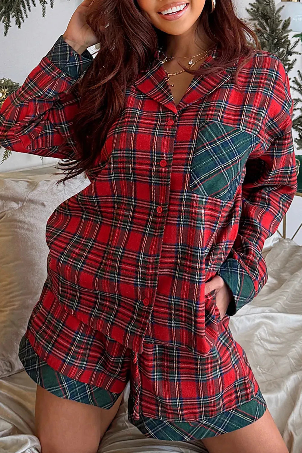 Red plaid Christmas holiday pyjama set with long sleeve shirt and shorts featuring contrast patched design