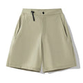 Men's quick-drying nylon spandex sports shorts in khaki colour with elastic waist and 3D cut design.