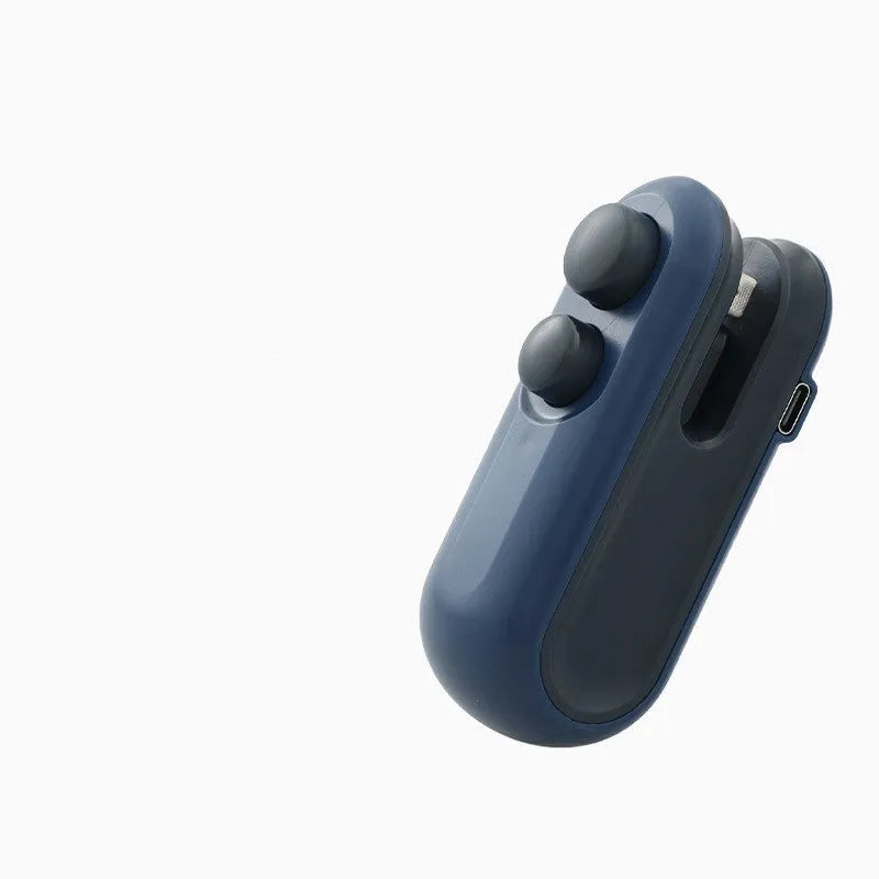 Blue and white handheld USB rechargeable food sealer with magnetic back and cutter blade.