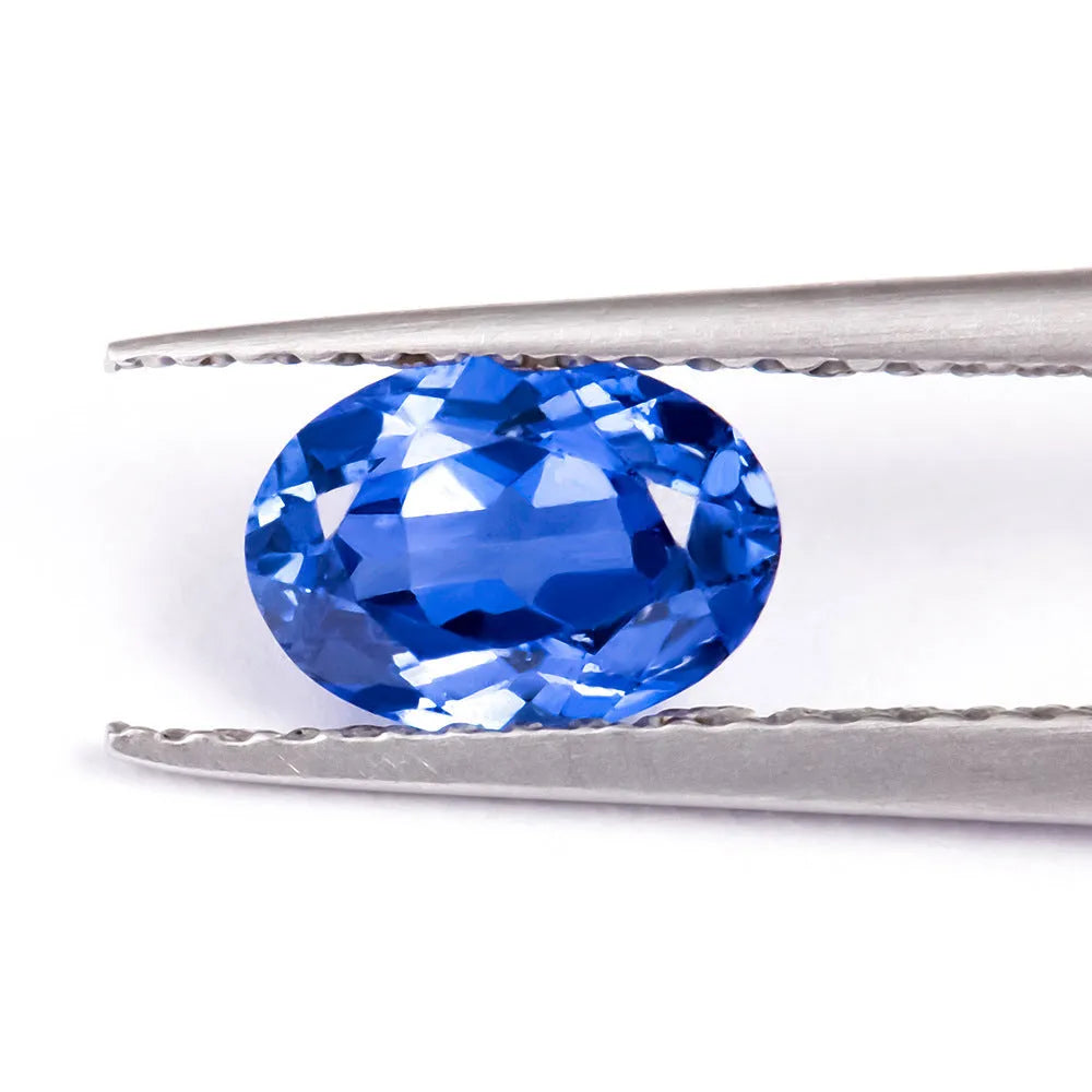 Royal blue synthetic gemstone showing heart, round, and pear cut shapes for jewellery making