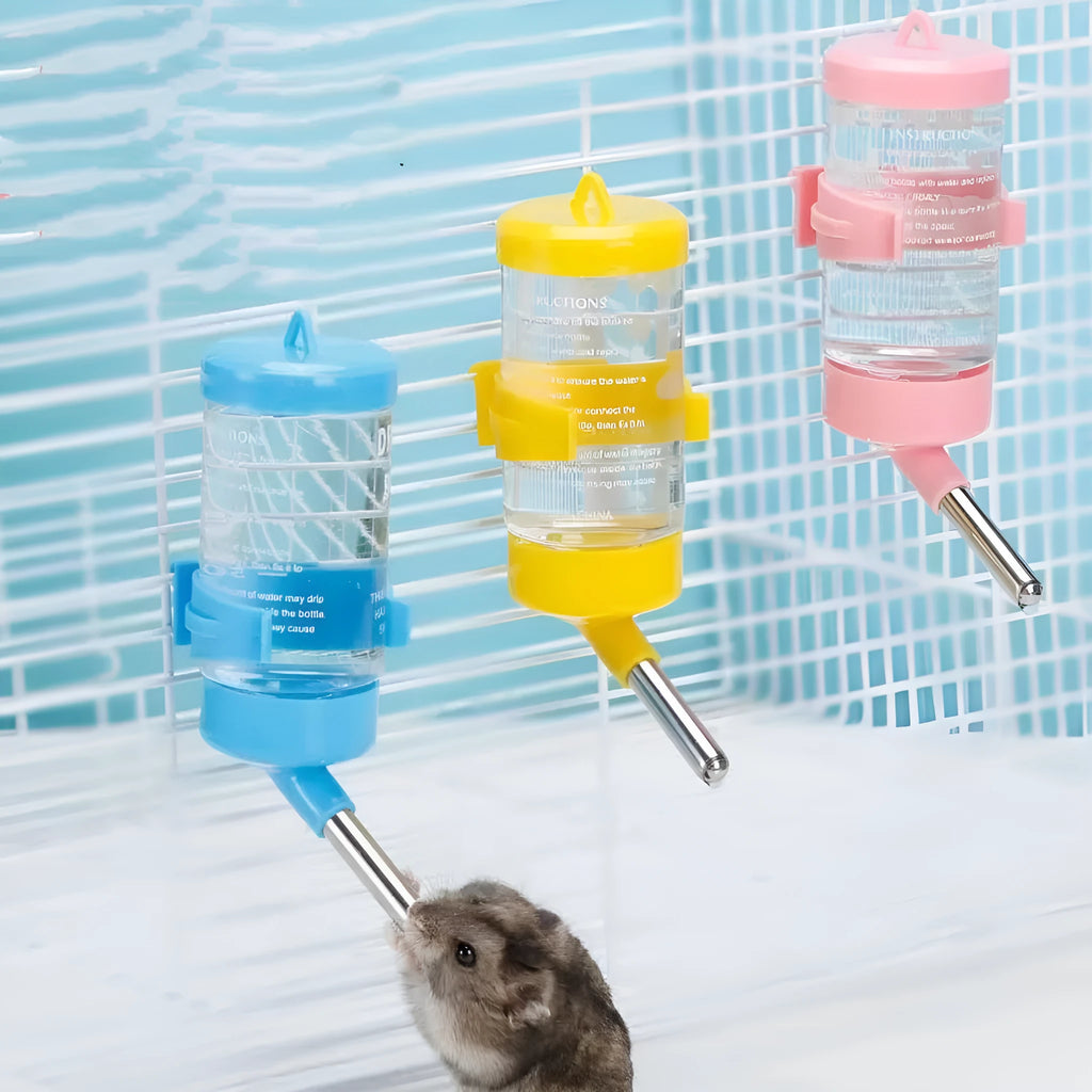 Green plastic leak-proof ball kettle water feeder for small pets like rabbits and guinea pigs.