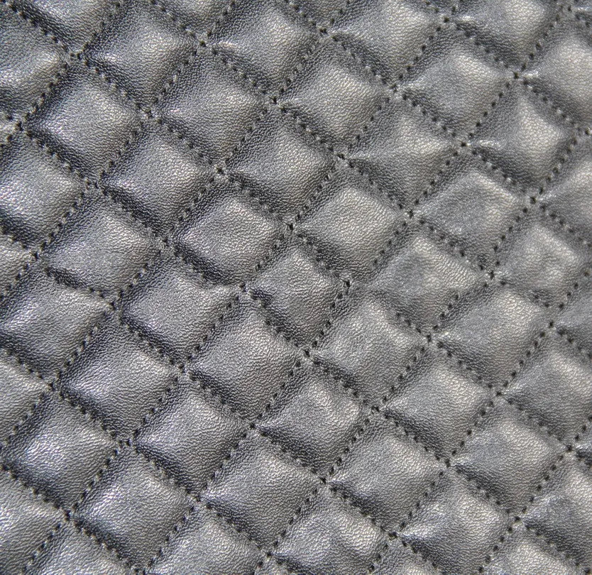 Black quilted universal car seat cover made from PU and polyester fabric with sponge composite.