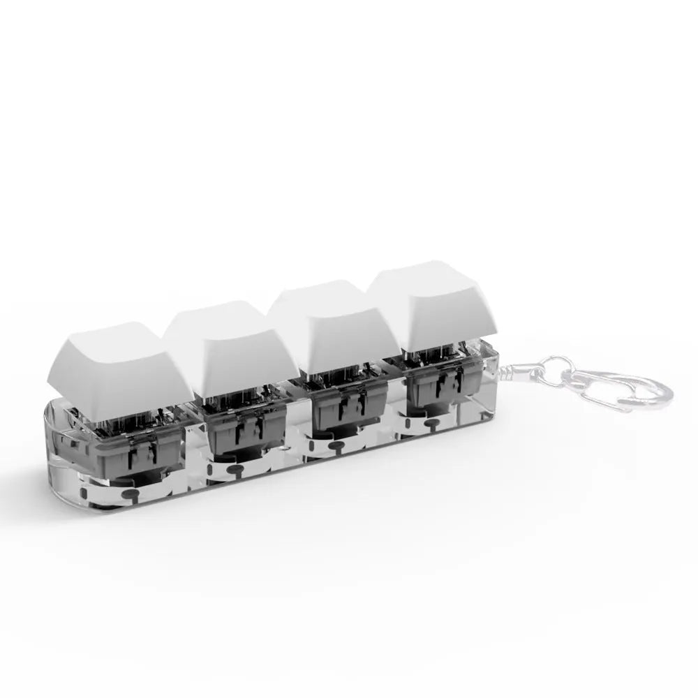 4-key mechanical keyboard switch tester with transparent bottom shell on desk