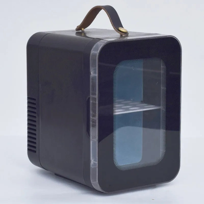 Pink mini refrigerator with transparent door showing internal storage compartments